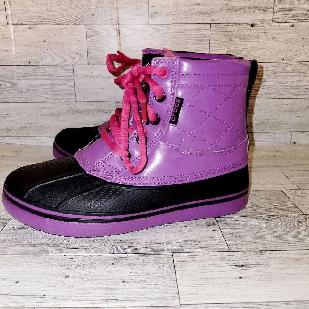 Crocs Dahlia and black allcast duck waterproof boots. ^